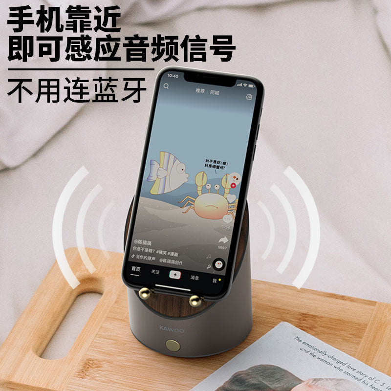 Induction bluetooth audio  desktop electronic clock, mobile phone holder, bluetooth speaker (Shipping not included)